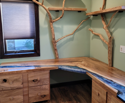 Elm desk with branches and shelving. 