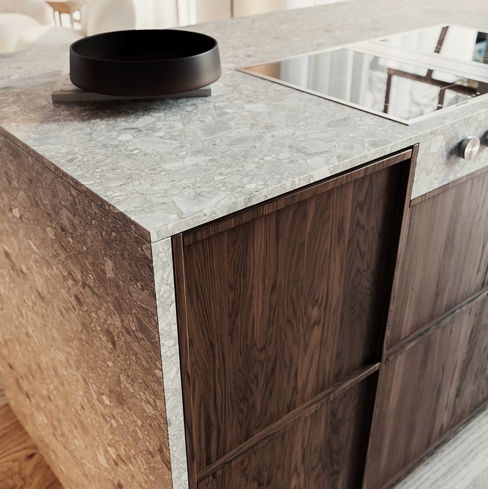 A wooden kitchen island with Dekton Arga surface, featuring a built-in oven.