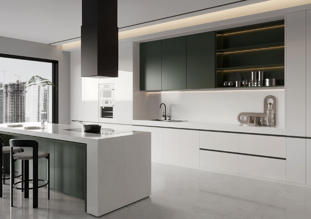 Modern minimalist kitchen with white and dark green cabinets, marble island, built-in appliances, and soft lighting overlooking a sleek urban view.