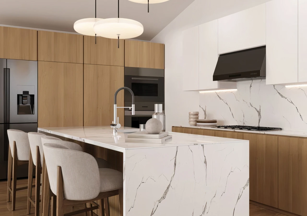 A white kitchen with a Dekton covered kitchen island in the center and a wooden-fronted pantry