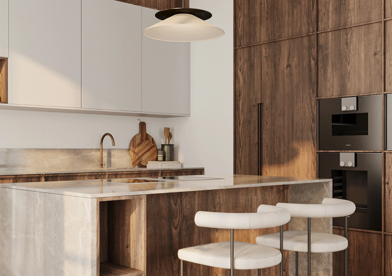 Beige kitchen with a stone island and white stools