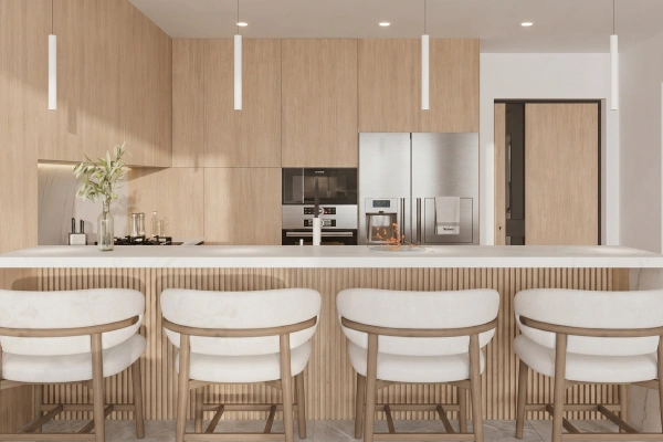Light oak kitchen with lit glass cabinets and wooden stools