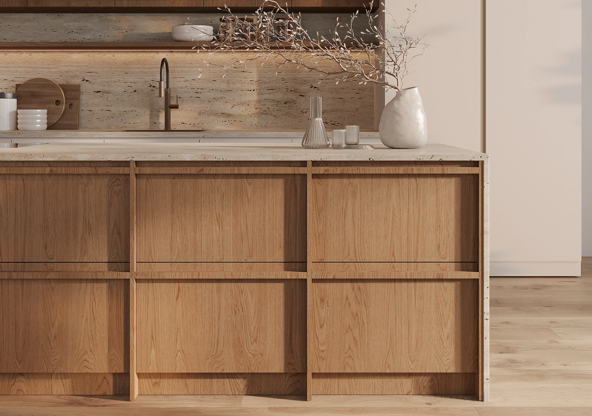 Oak frame-and-panel cabinets with a lit stone backsplash