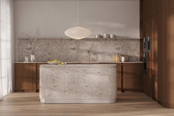 Walnut kitchen with a stone island and a white pendant