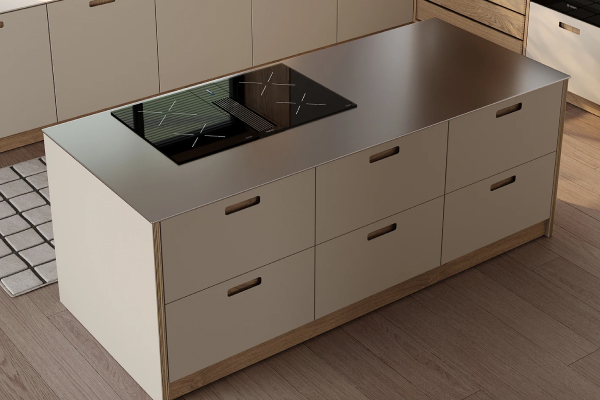 White minimalist island with a black cooktop