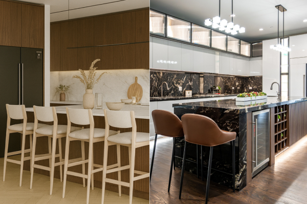White kitchen with a dark island, black backsplash and white stools