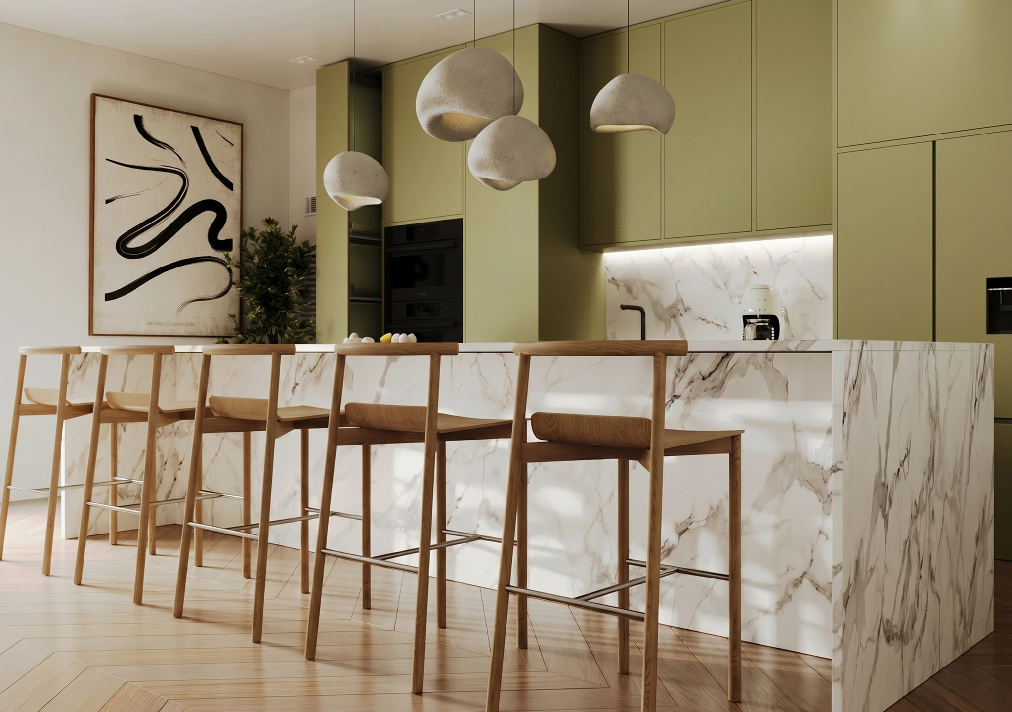 Sage green kitchen with a marble island and rattan stools