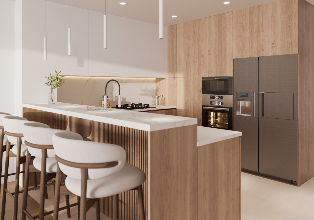 Oak kitchen with a stone island, two white stools and a stainless steel fridge