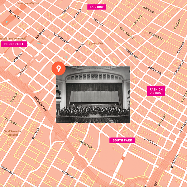 A black and white photo of Trinity Auditorium is overlayed a map of the surrounding streets in Downtown LA.