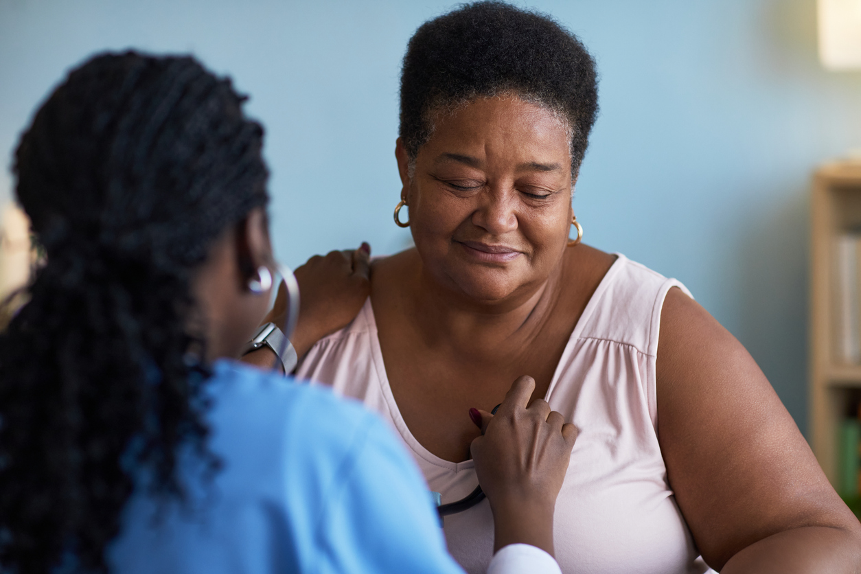 Woman at doctor getting her lungs checked