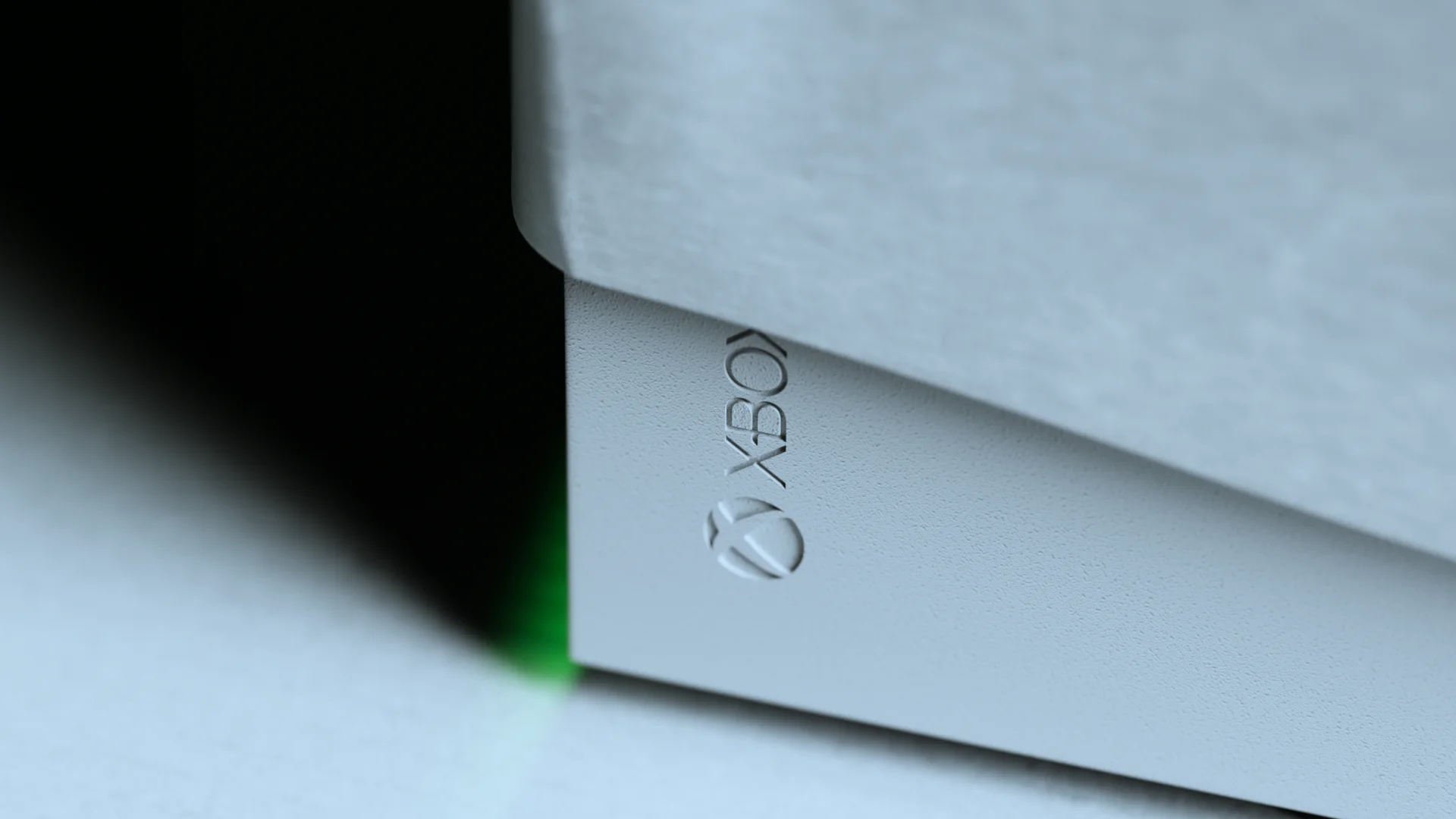 XBOX wordmark on the side of the white packaging with green rim light