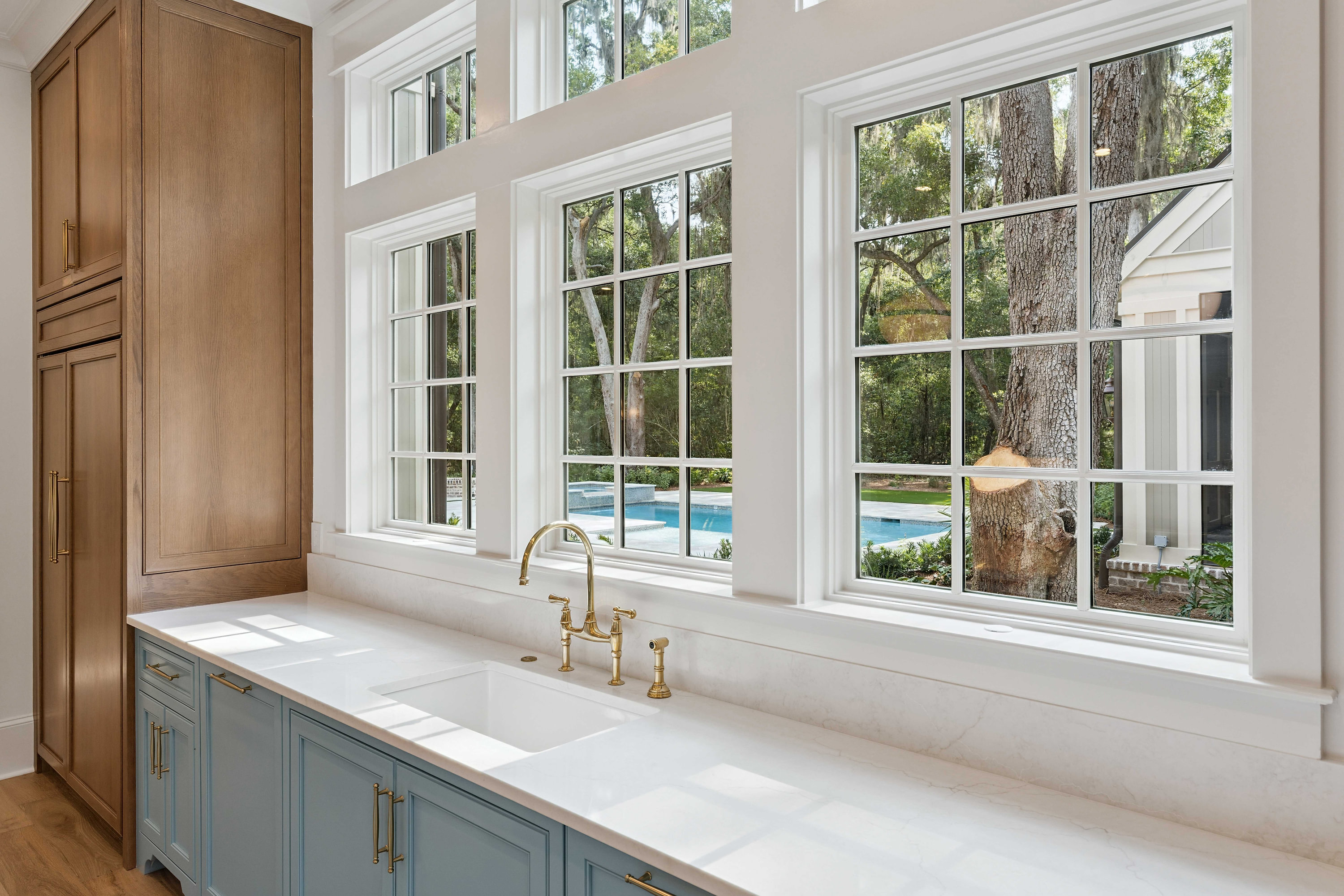 Moss Grove, Flanagan Development, St. Simons Island: kitchen sink under windows with pool view