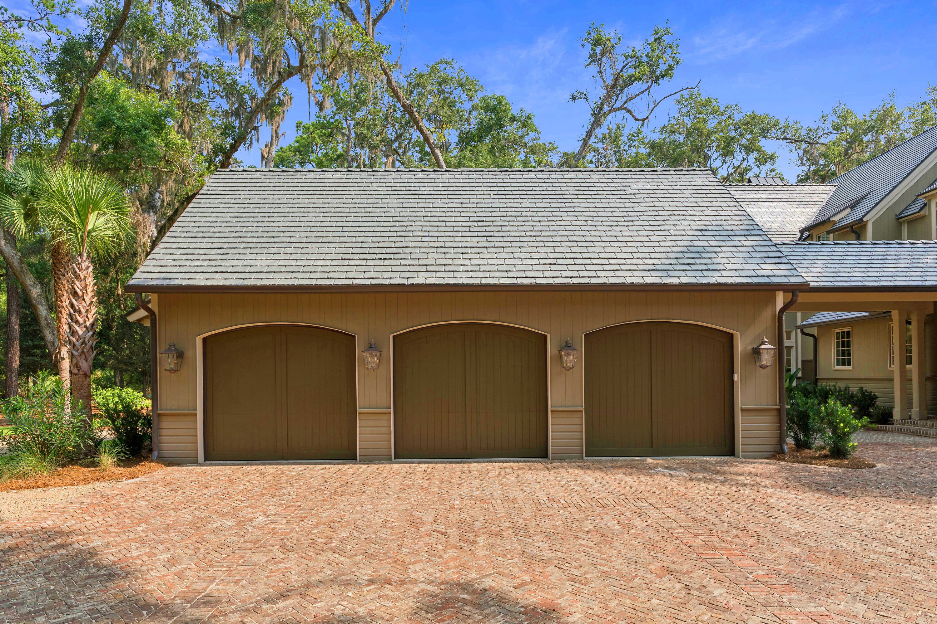 Moss Grove, Flanagan Development, St. Simons Island: three-car garage with arched doors