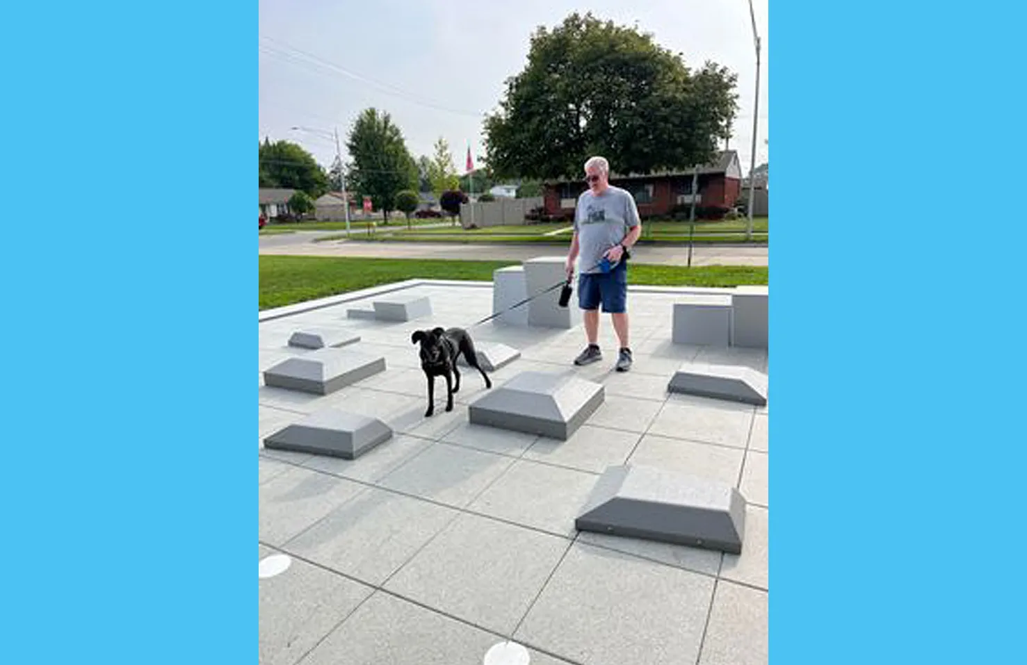 man and dog on fitness court
