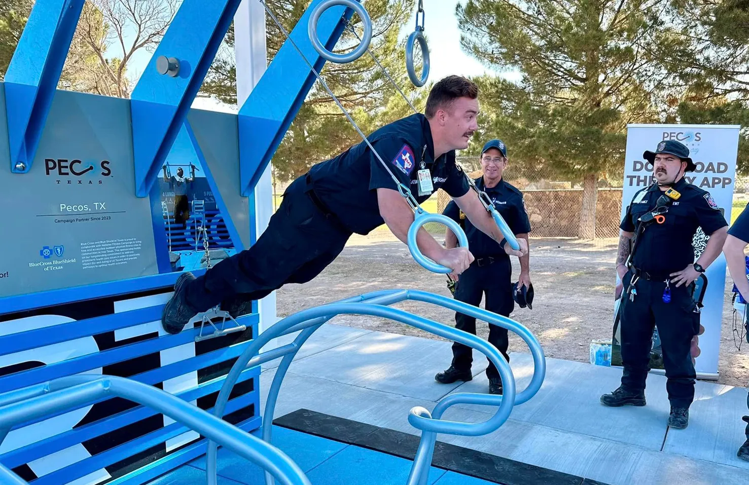 sheriff using push station on fitness court