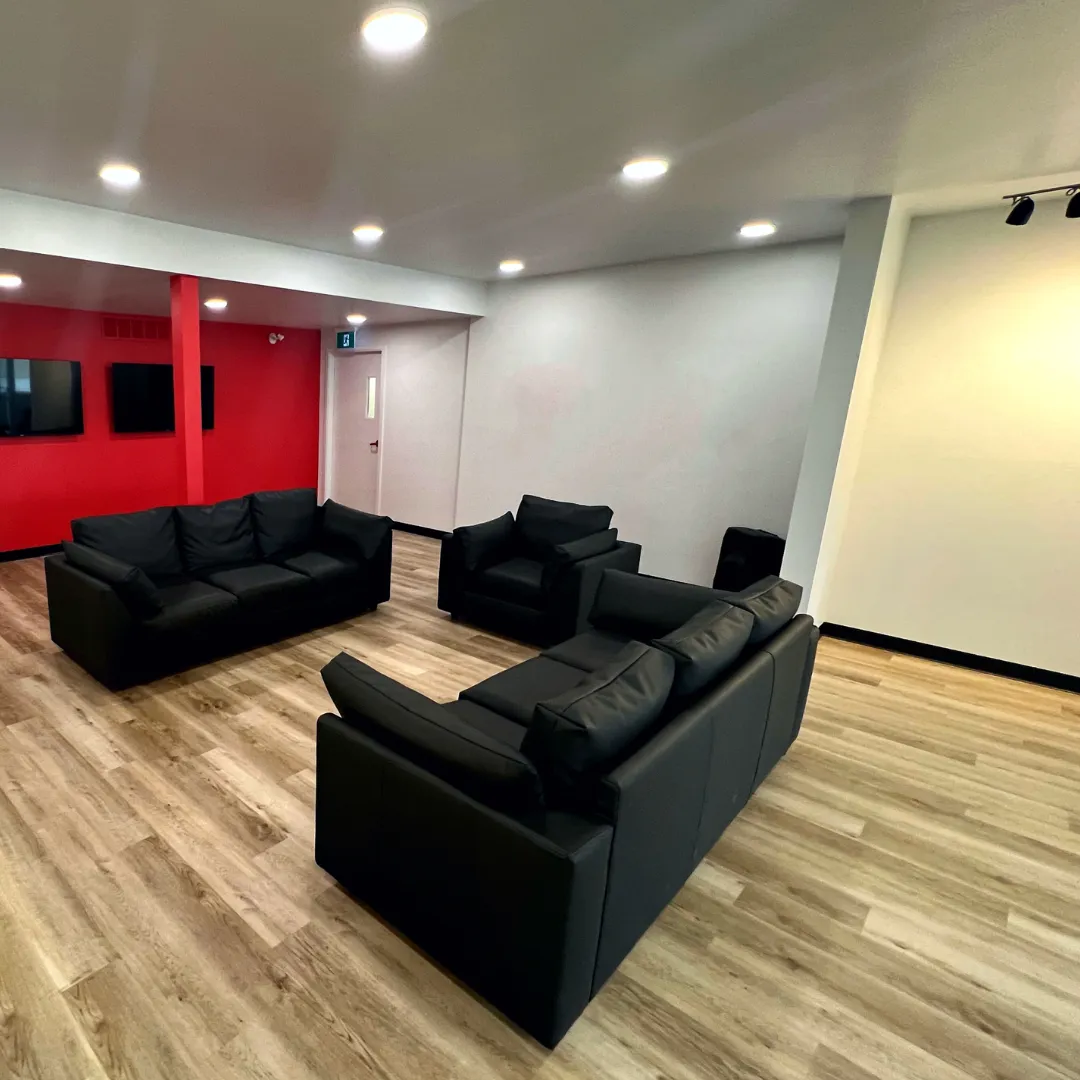 Image of HoopLife's Lobby with a Large Logo Sign