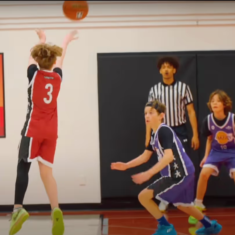 A basketball player shooting the ball