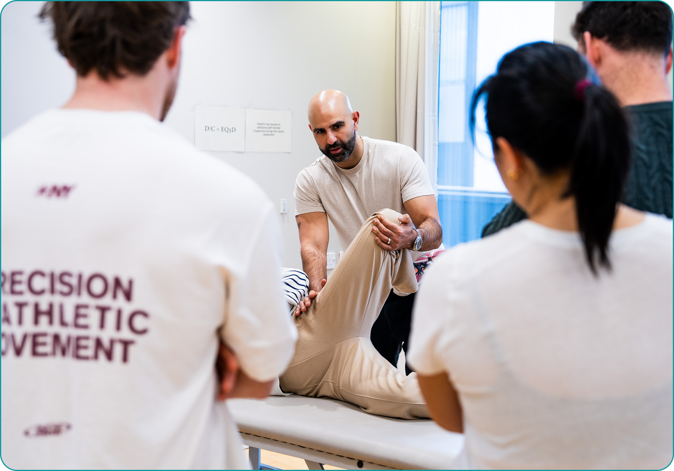 Expert mobility guidance demonstrating leg and hip flexibility exercises.