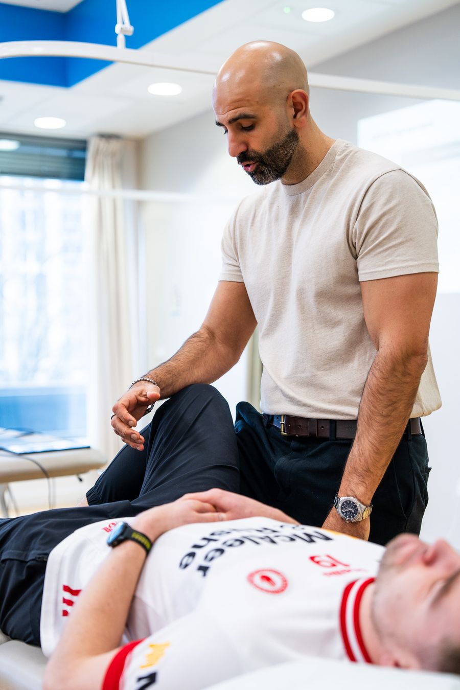 Mehmet Gem treating a patient