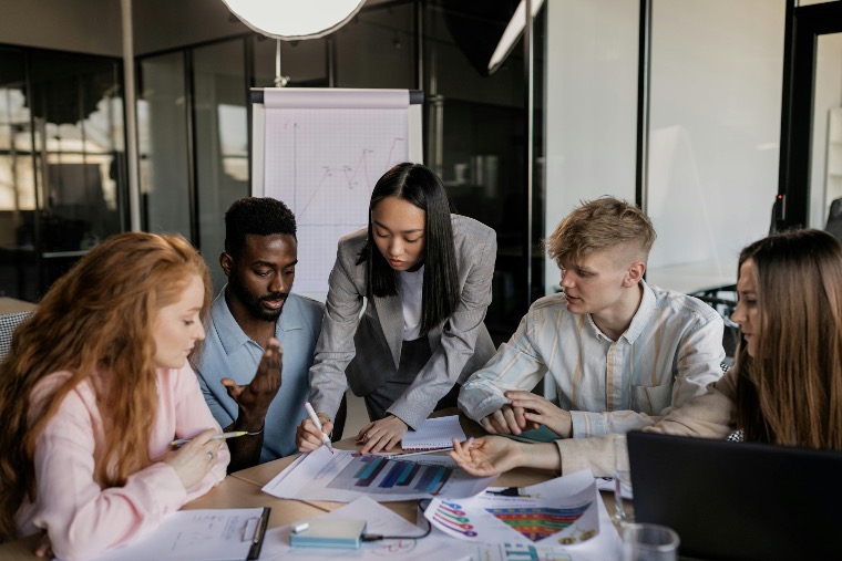 Group of young professionals collaborating in an office setting