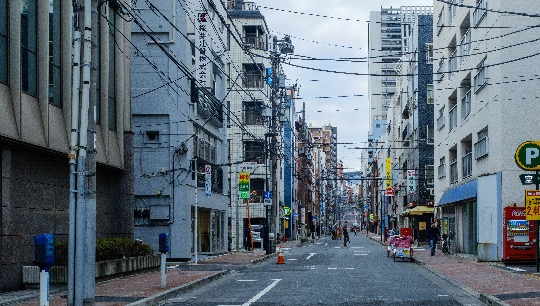 Buildings and apartments on a street in Japan.