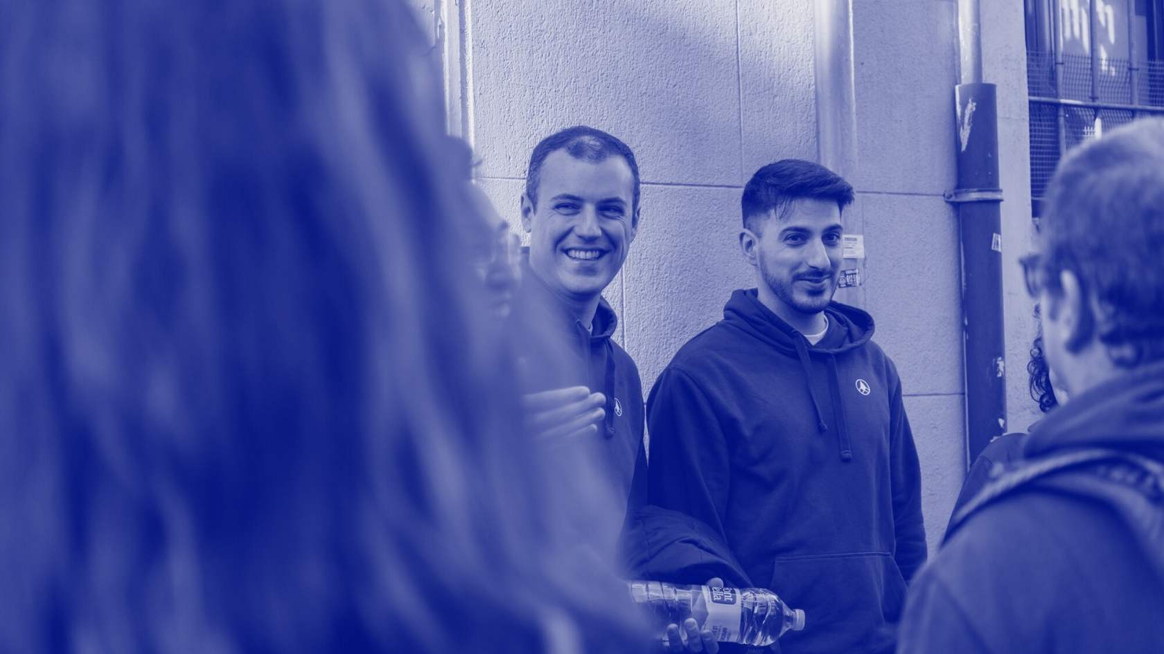 Three people attending a training about data and AI