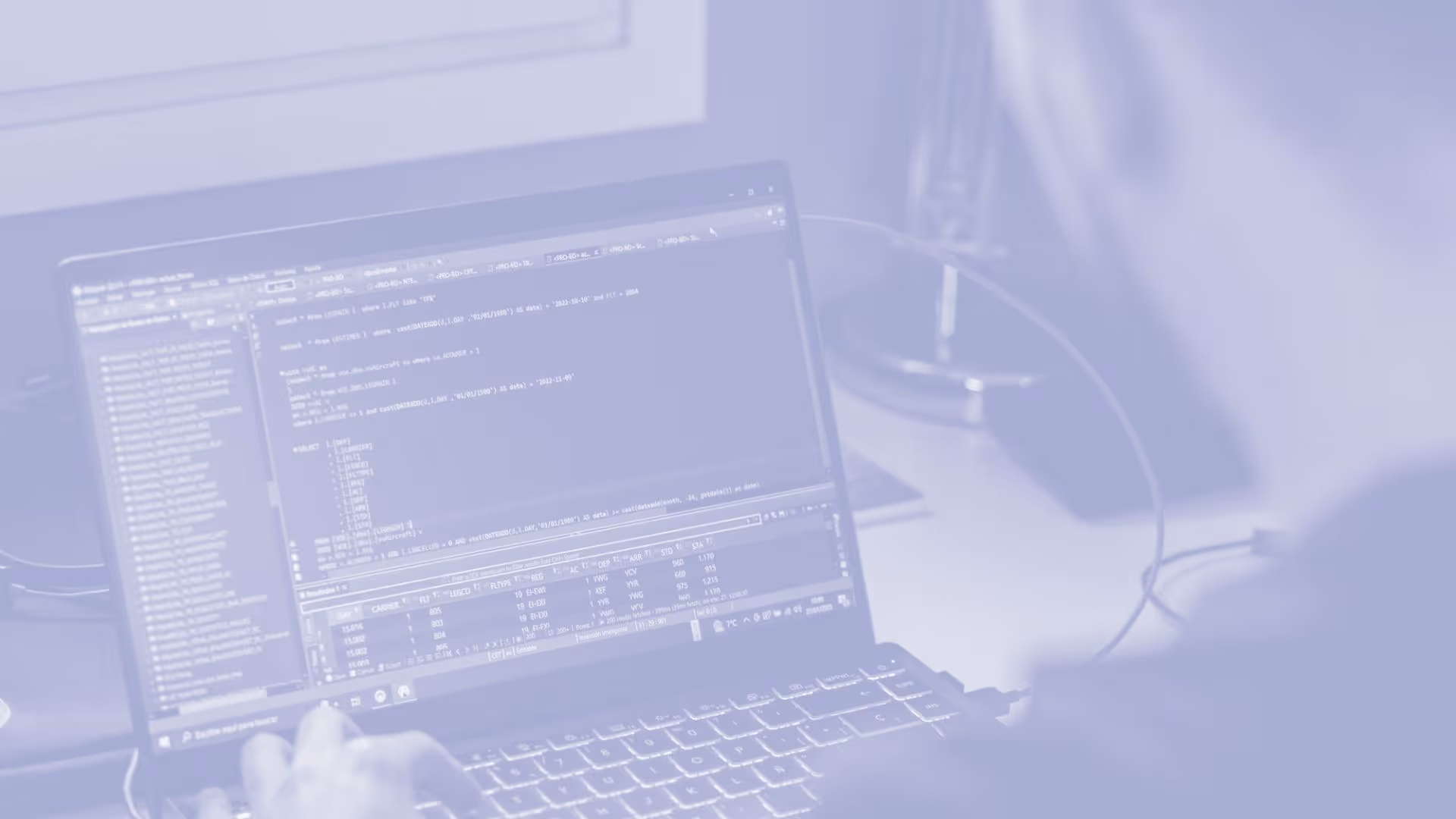 A laptop showing code work needed for data services.