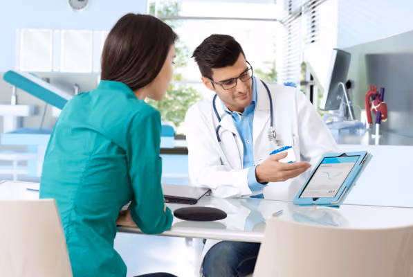 Doctor reviews Sway data with patient