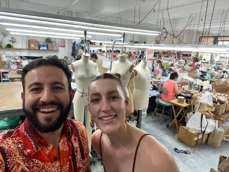 Smartphone screen showing text about Voyager film starter kit and an image of a black film camera with 35mm film and a AAA alkaline battery on a black padded pouch.