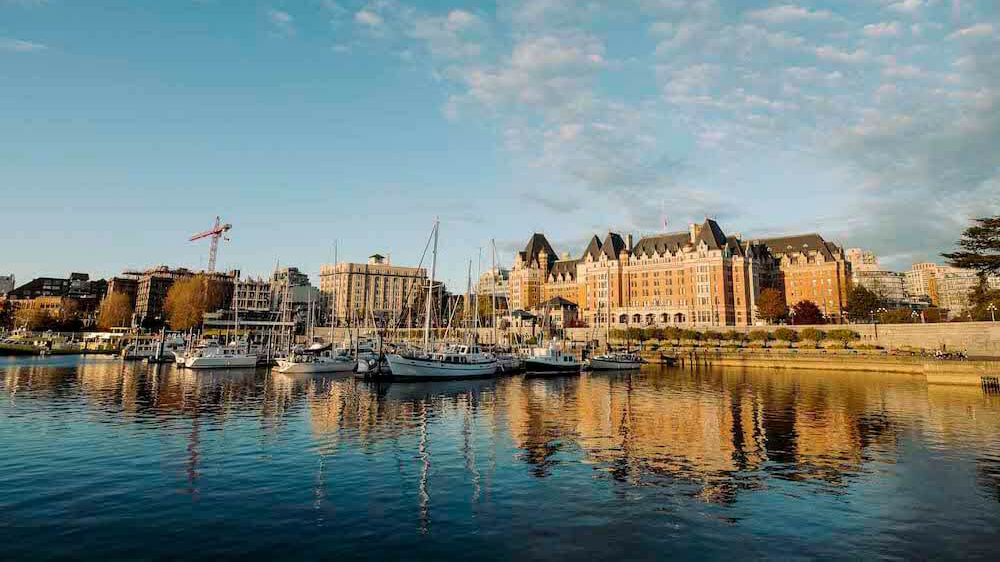 View of the Empress Hotel and downtown Victoria BC as seen from the Victoria Harbour