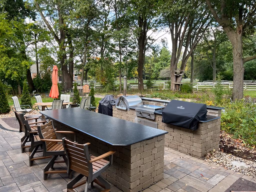 Beautiful Highland Park, IL outdoor grill station with a granite countertop by Marble And Granite Tech