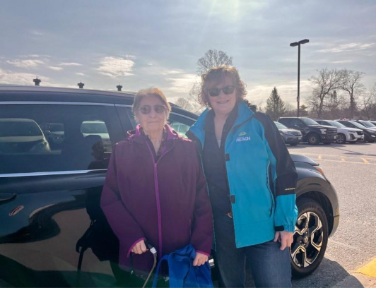Community Reach volunteer driver Laurine Moreau, right, believes in the social values the accessible transportation team provides to people like Rose Herron who says she wouldn't be able do things without it.