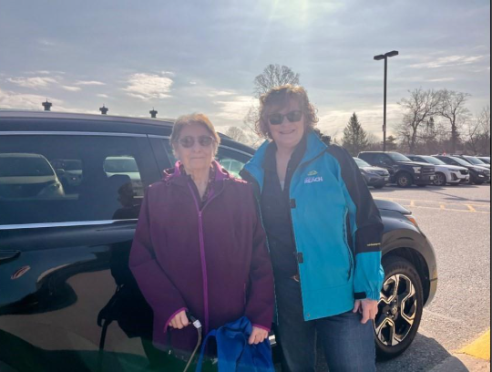 Community Reach volunteer driver Laurine Moreau, right, believes in the social values the accessible transportation team provides to people like Rose Herron who says she wouldn't be able do things without it.