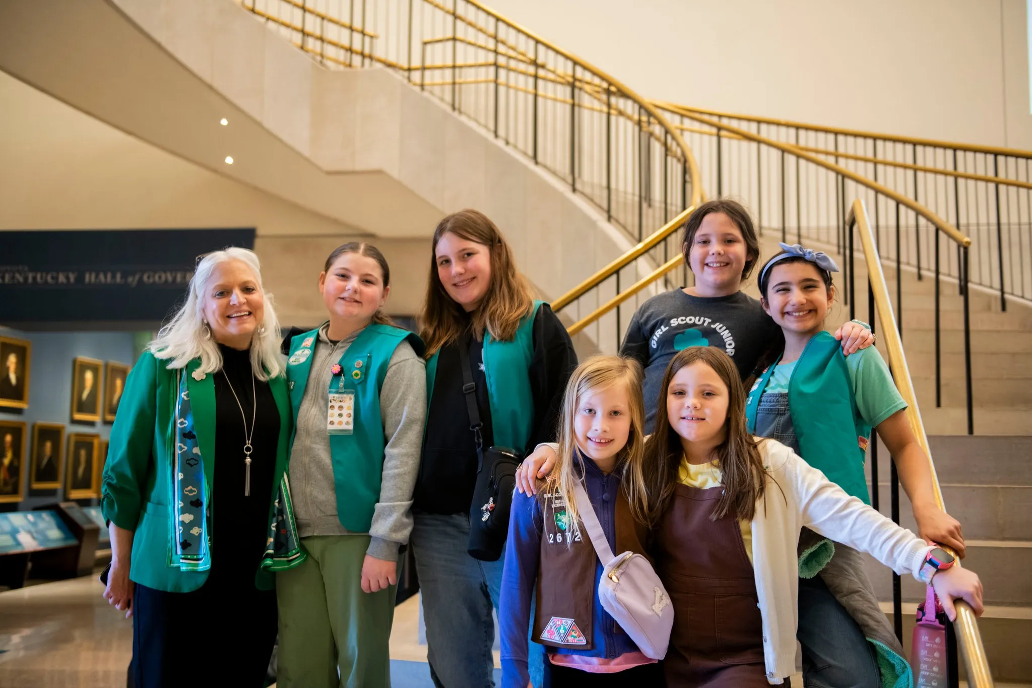 Susan Douglas celebrates Girl Scouts’ 114th birthday with a troop at the Kentucky Capitol, an example of the leadership-building experiences GSKWR works to make accessible to every girl