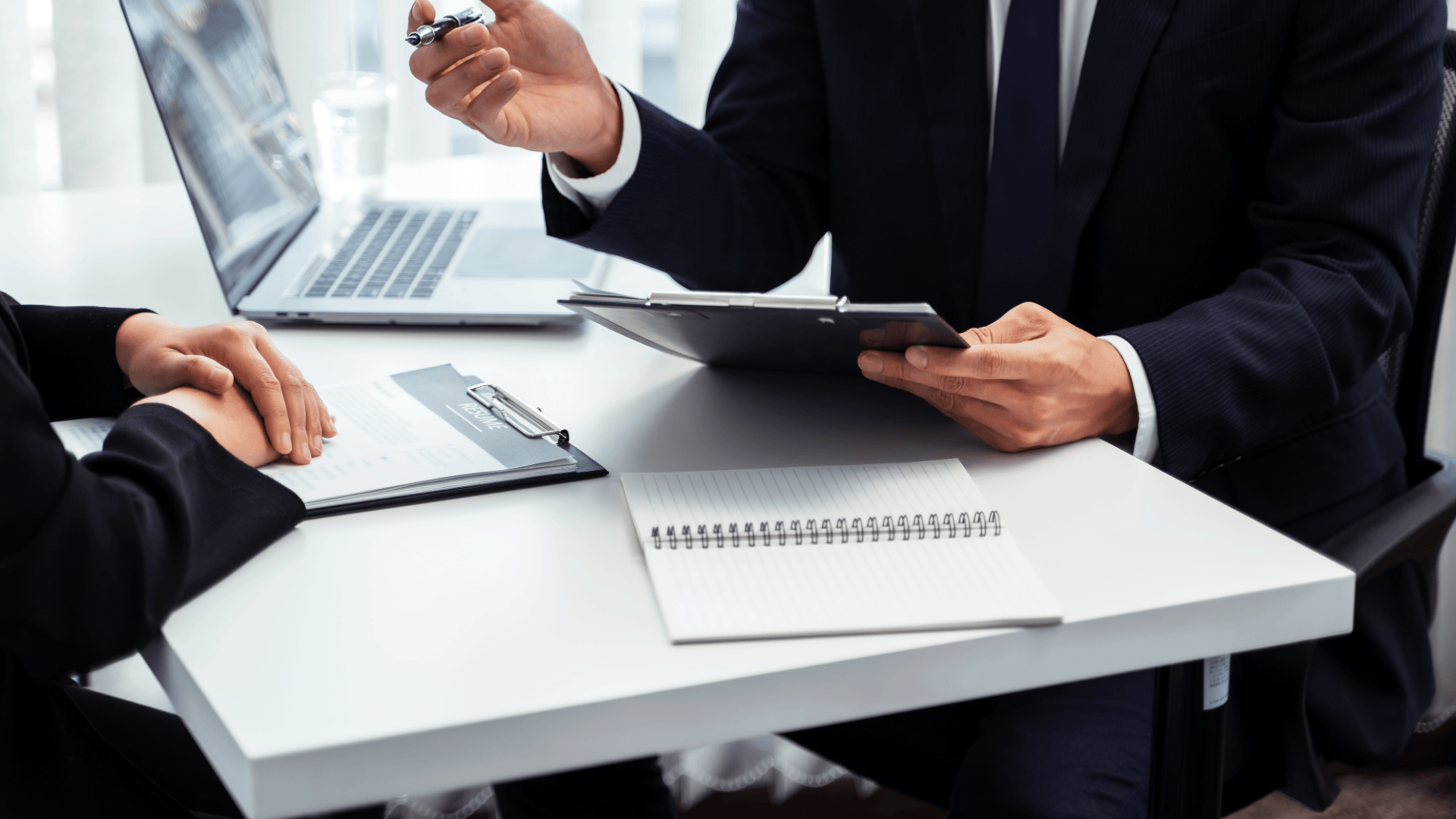 HR meeting taking place at a desk