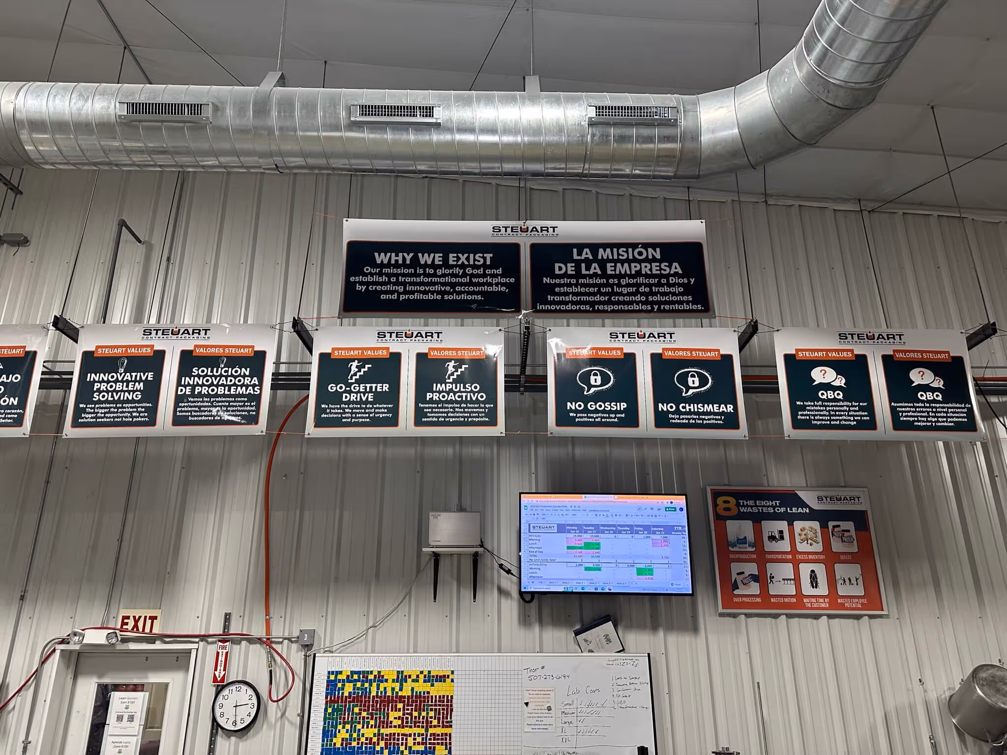 Banners of Steuart Nutrition core values posters located within the warehouse.