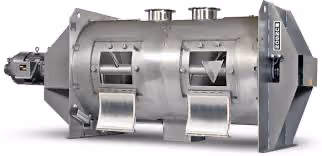Industrial plow blender with angled mixing plows creating a fluidizing effect for efficient large-batch powder blending in supplement production | Steuart Nutrition