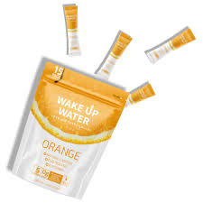 Wake Up Water orange electrolyte drink mix packaging with pouch and stick packs shown as an example of supplement packaging die line design | Steuart Nutrition