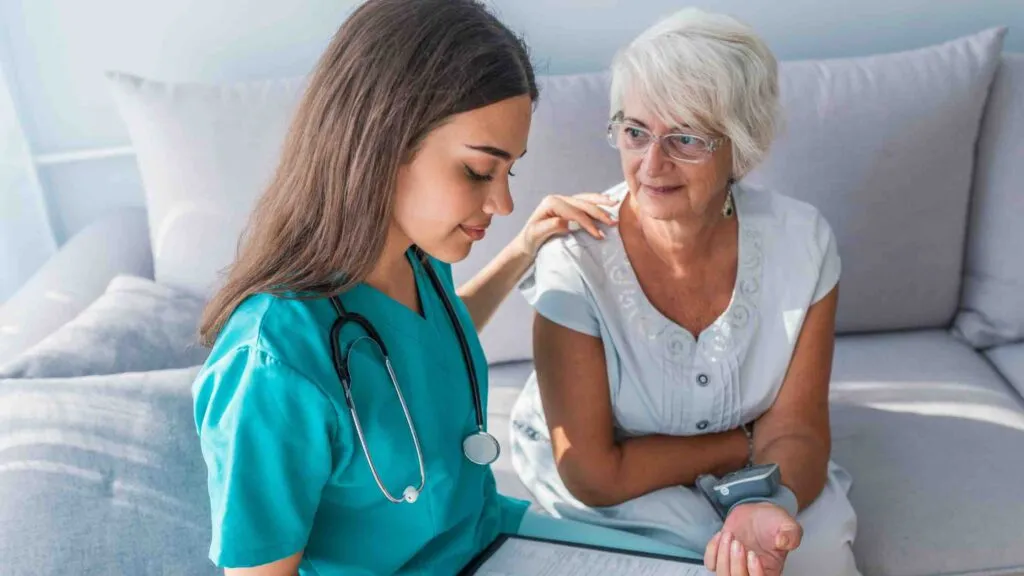 nurse helping patient 