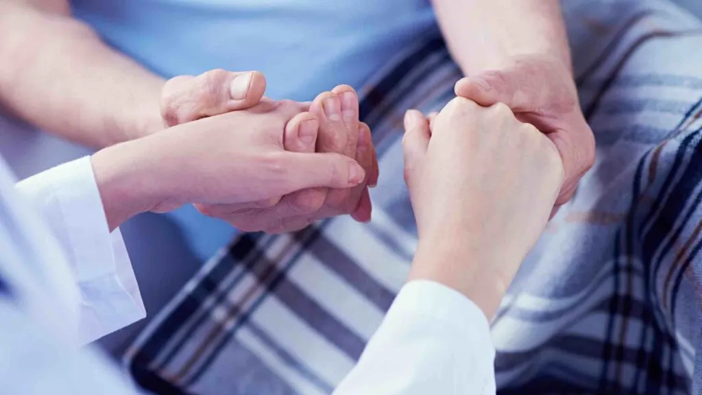 holding hands nurses