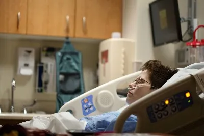 young patiet dying in hospital bed