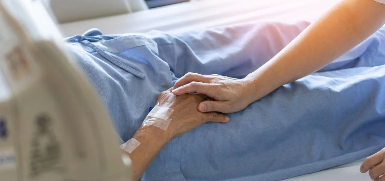 OR nurse holding the hand