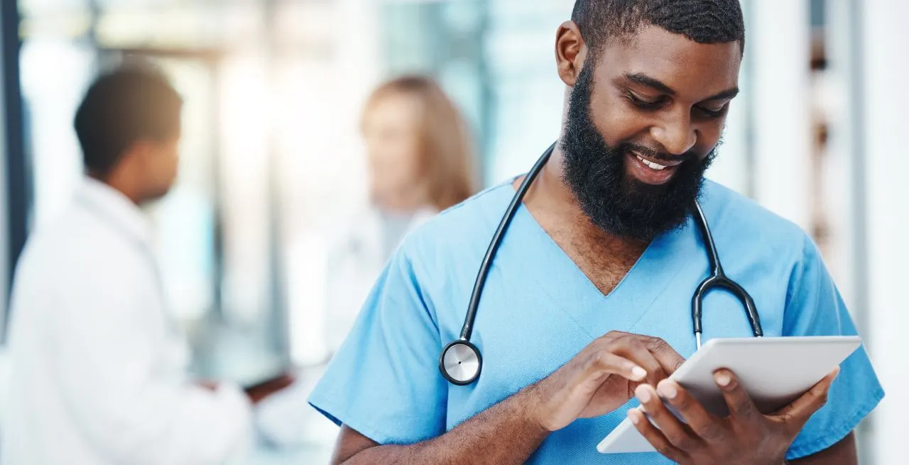 RN using tablet to pick up positions