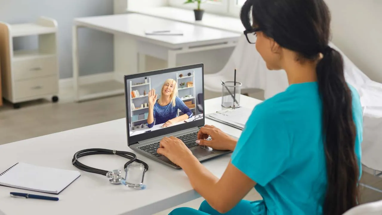 A Telehealth nurse helping meeting with a patient