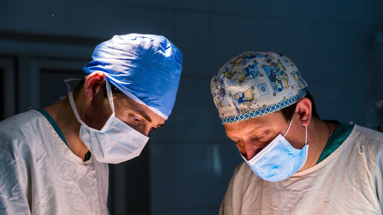 two doctors during surgery