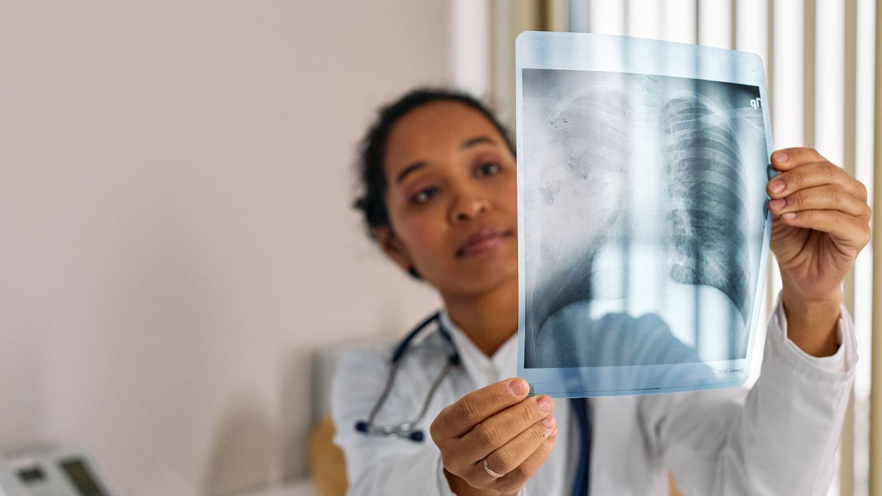 view of a doctor checking a cardiac image