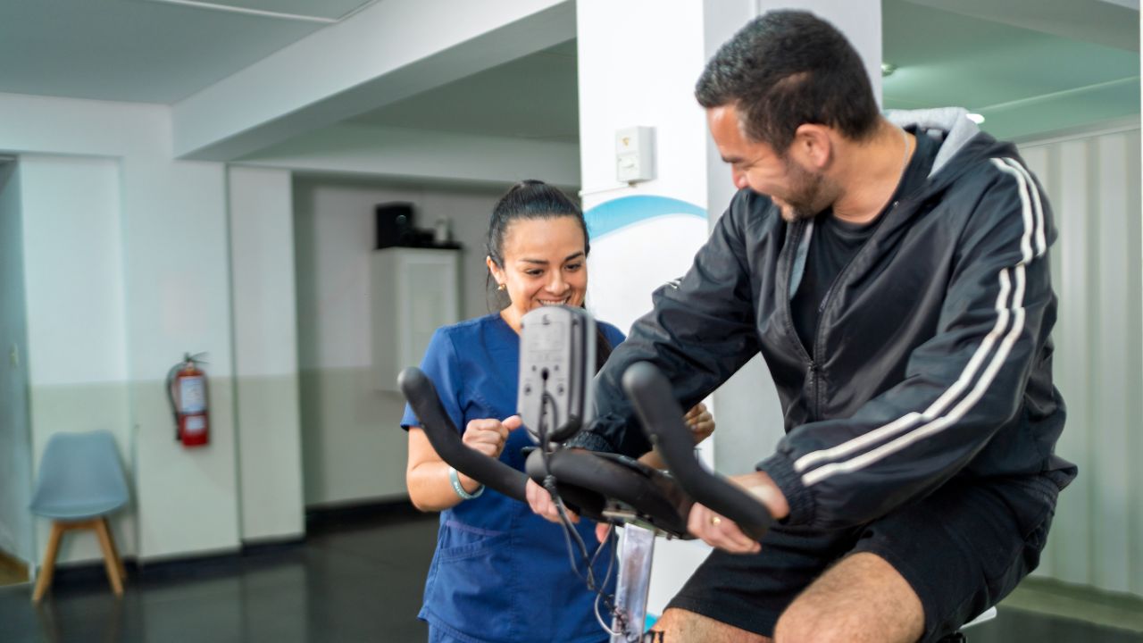 sports cardiology healthcare professional with a patient