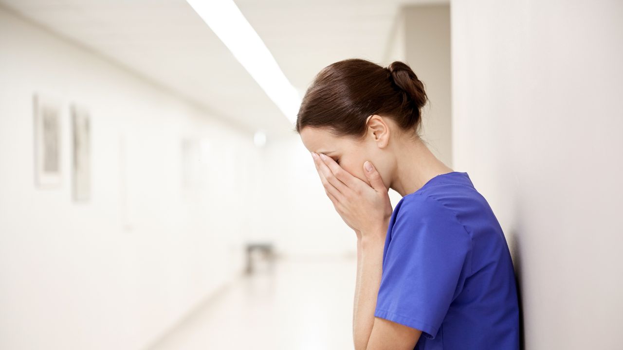 picture of a nurse crying for being sexually harassed