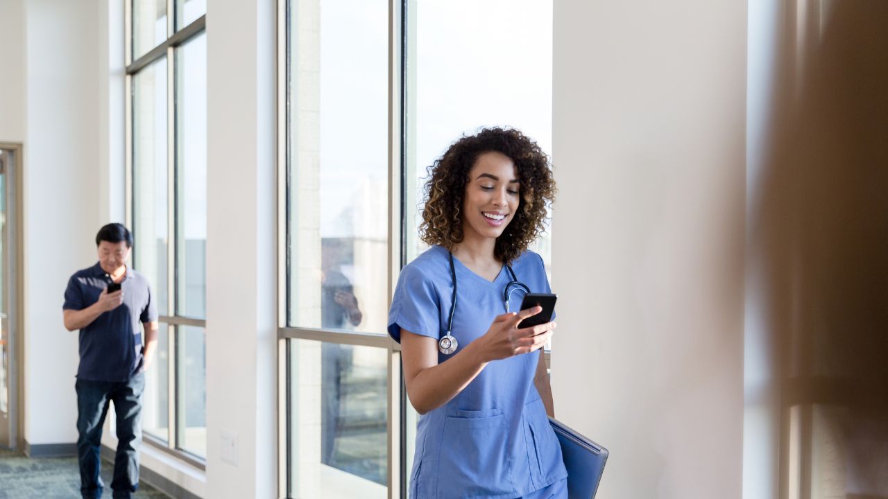 nurse looking at her phone