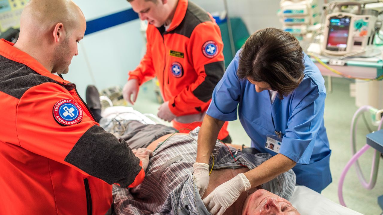 Medical professionals during emergency with patient